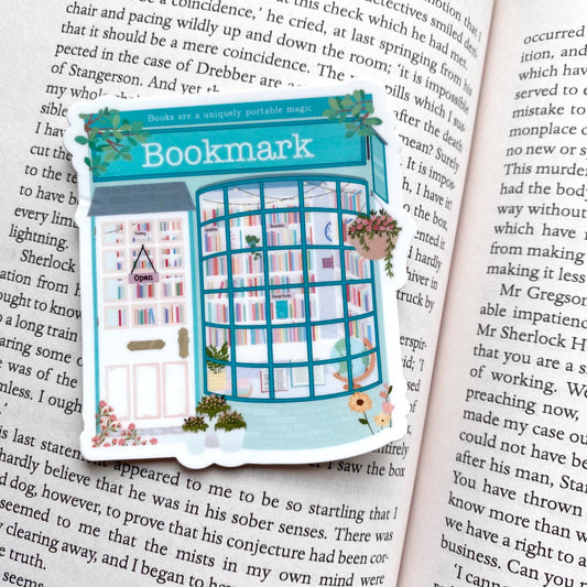 Sticker with a design of a bookshop on an open book