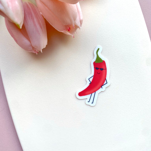 Transparent vinyl sticker with a cartoon red chili pepper with sunglasses