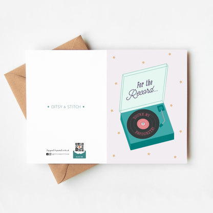 Greeting card with record player design  and 'For the record... you're my favourite' message and an envelope on a white background
