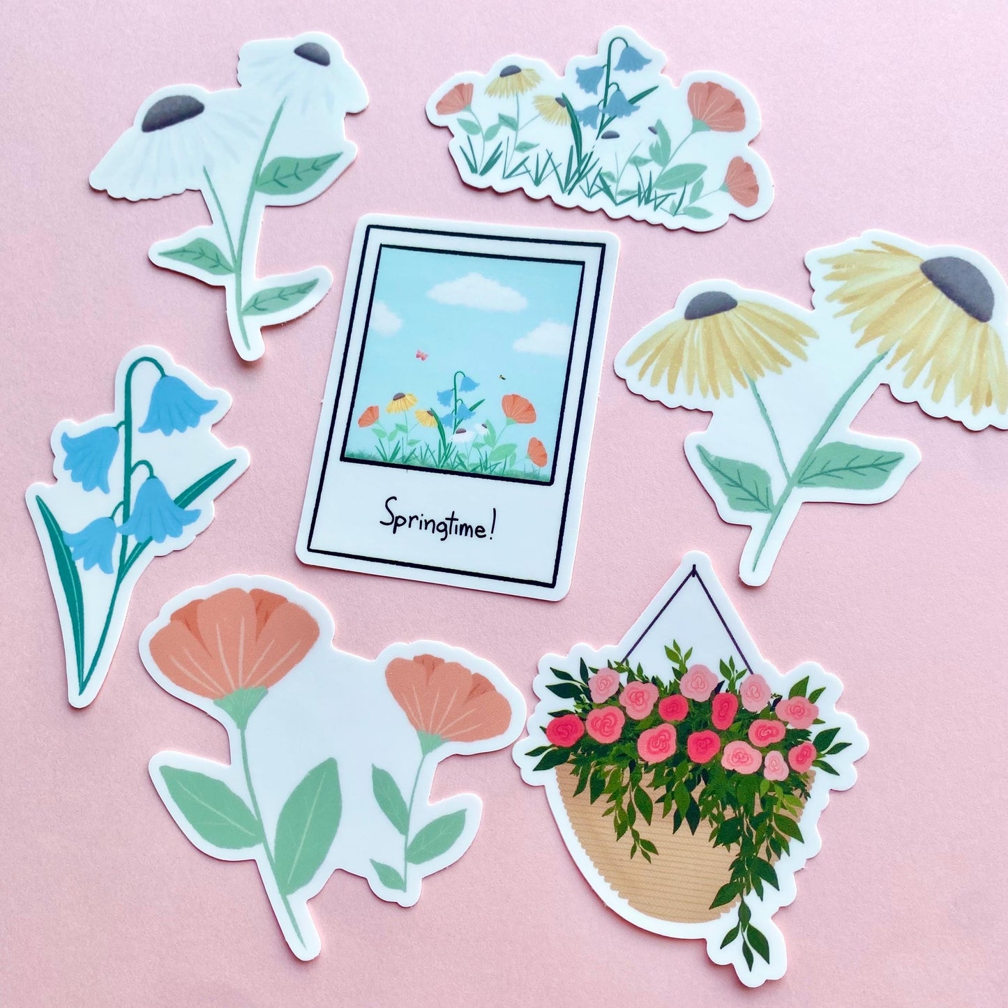 Set of 7 floral and nature-themed spring stickers on a pink background