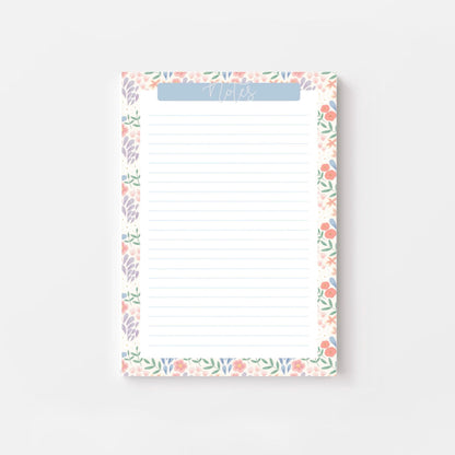 Floral border notepad on a white background