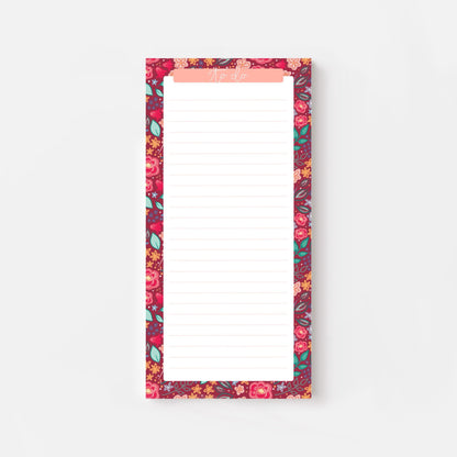 Floral-patterned slim notepad with a pink border on a white background