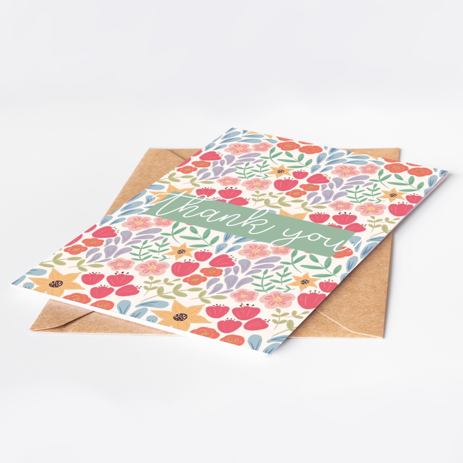Floral card with 'Thank you' text on a white background