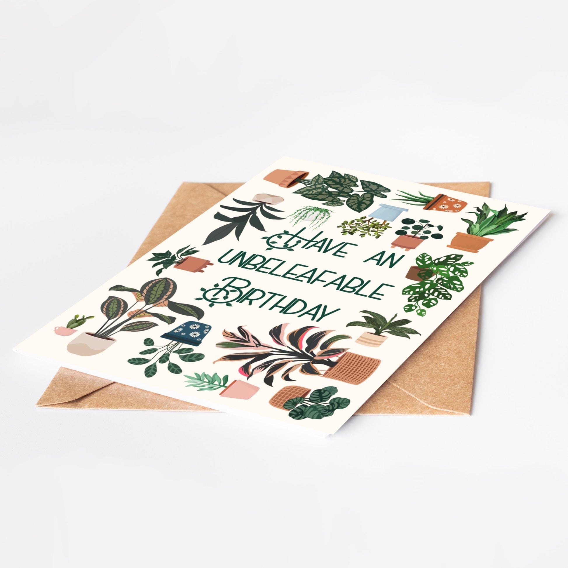 Birthday card with plant illustrations and 'Have an unbeleafable birthday' text on a white background