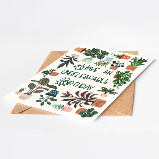 Birthday card with plant illustrations and 'Have an unbeleafable birthday' text on a white background