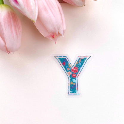 Colourful letter 'Y' sticker with pink tulips on a white background