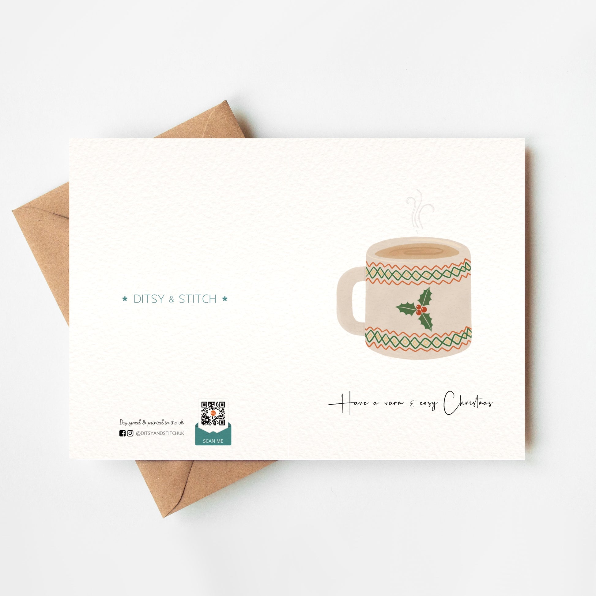 Greeting card with a festive mug illustration and 'Ditsy & Stitch' branding on the back.
