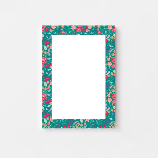 Floral patterned notepad on a white background