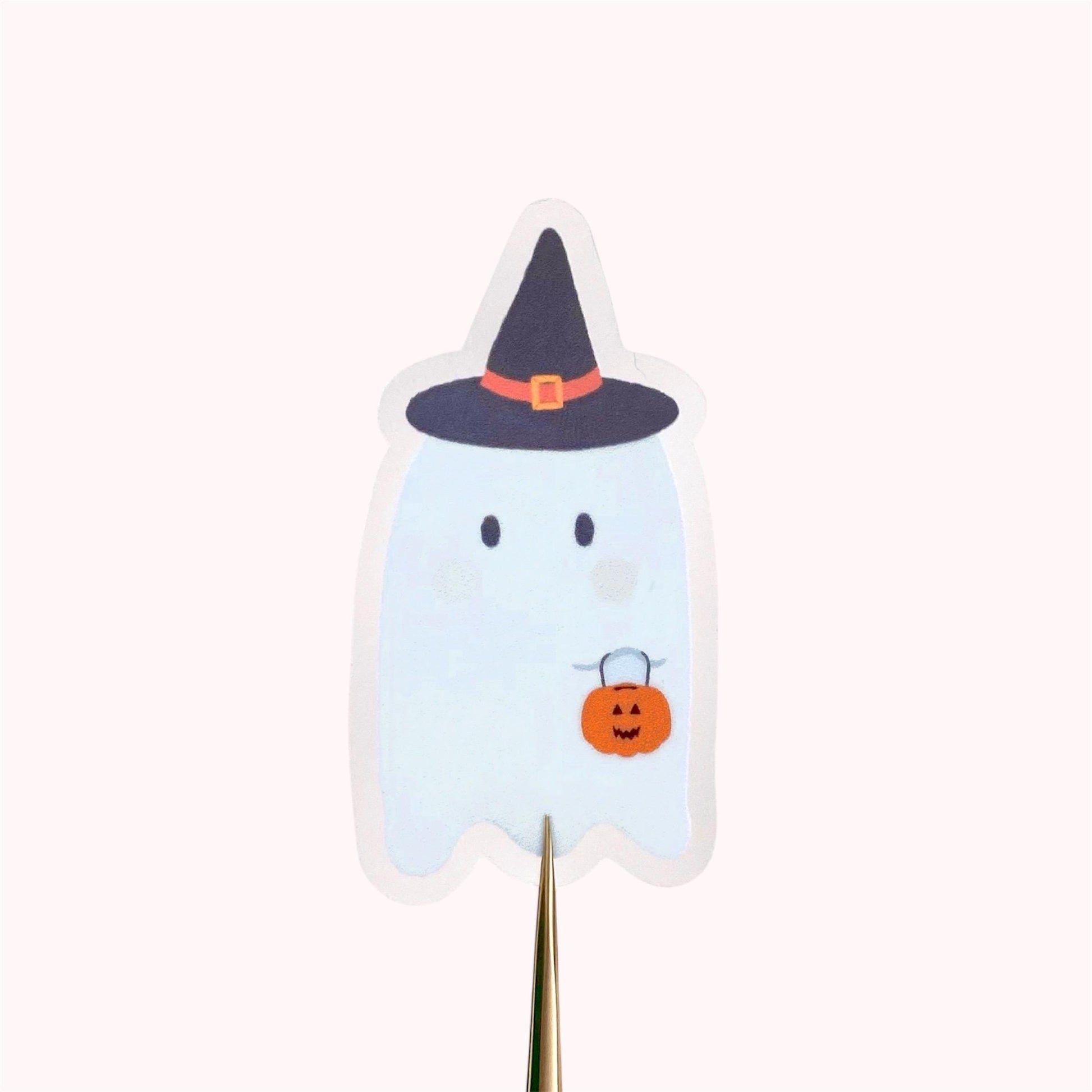 Halloween-themed ghost sticker with a witch hat and pumpkin on a white background