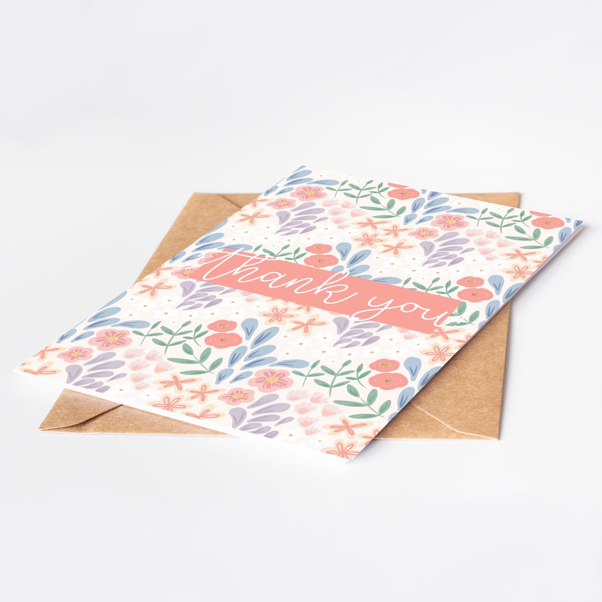 Floral card with 'Thank you' text on a white background