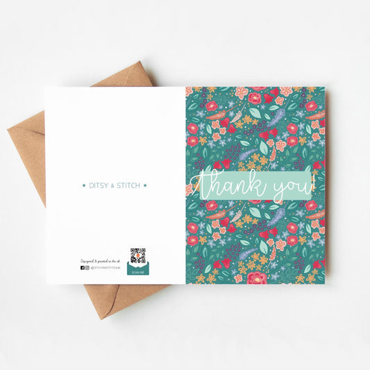 Floral patterned card with 'Thank you' text and Ditsy & Stitch branding on the back on a white background.
