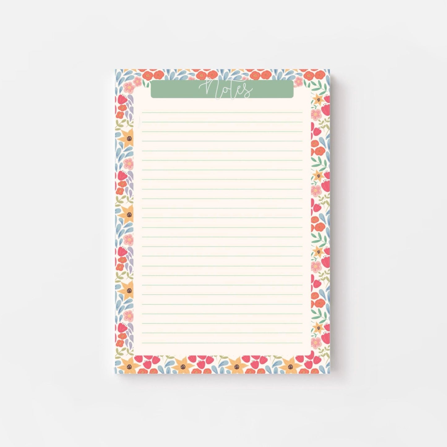 Floral bordered notepad with lined paper on a white background