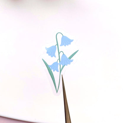 Decorative bluebell flower design on a white background