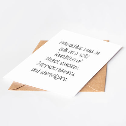 Card with humorous text on a white background