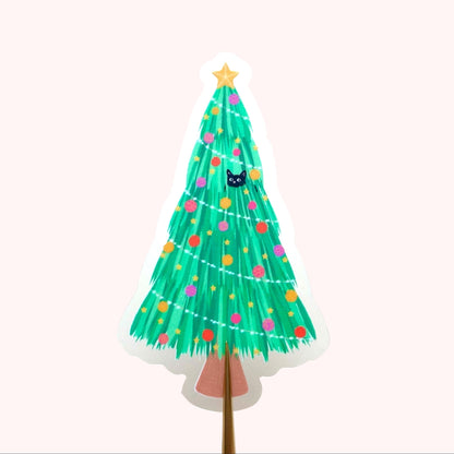 Decorative Christmas tree sticker with colourful ornaments and a star, with 2 black cats playing in and around the tree. On a white background