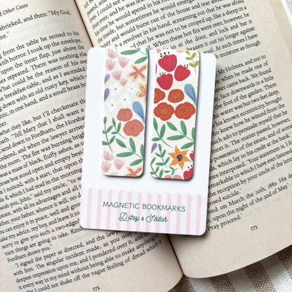 Floral magnetic bookmarks on a book with 'Ditsy & Stitch' branding.