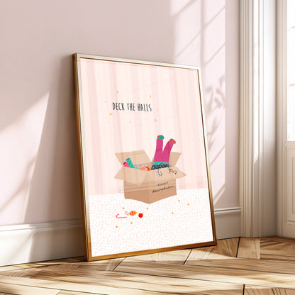 A pink striped illustration with a box of Christmas decorations and colourful lights and a girls legs in pink trousers and mismatched socks dangling out of the top