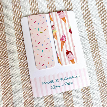 Set of magnetic bookmarks with ice cream and sprinkles designs on a striped fabric background
