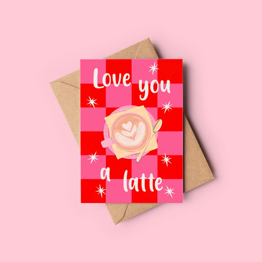 Greeting card with 'Love you a latte' text and a coffee cup illustration on a pink background