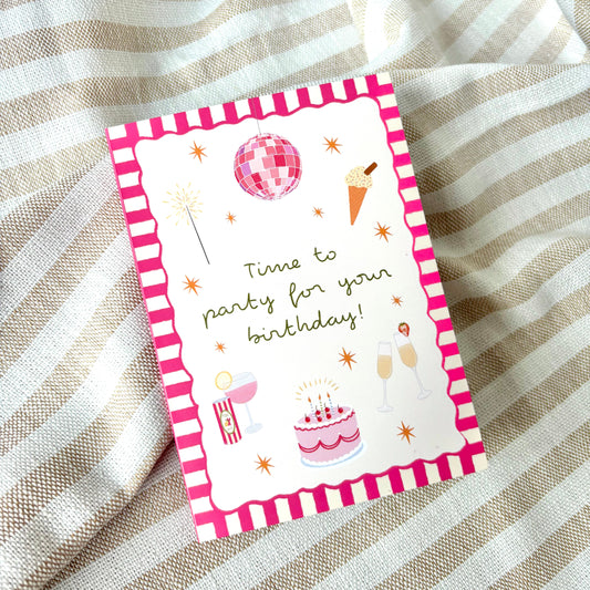 Birthday card with pink girly disco party illustrations on a striped fabric background