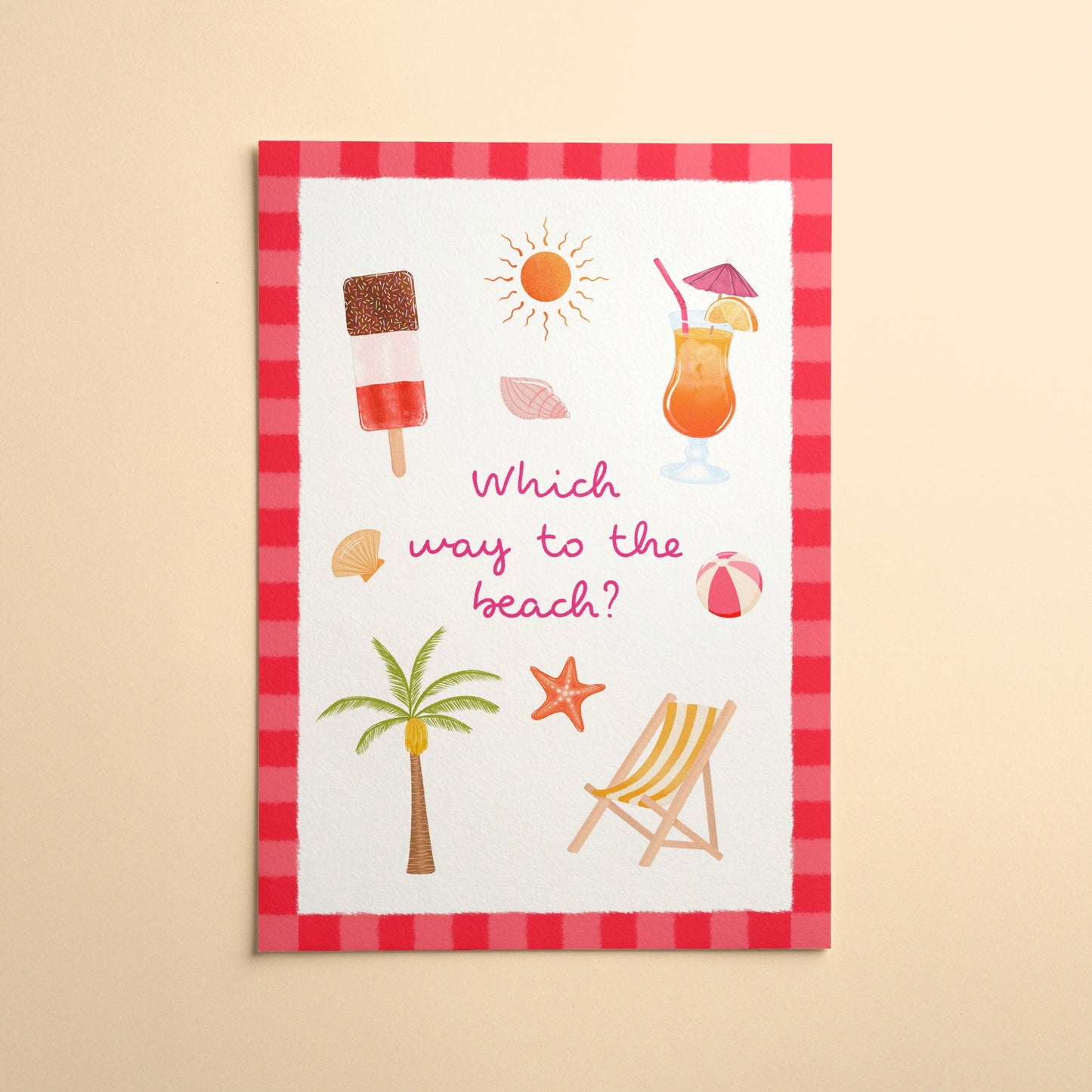 An art print with a red and pink striped border featuring summer beach-themed illustrations and the text 'Which way to the beach?' in pink script, displayed against a warm yellow background.