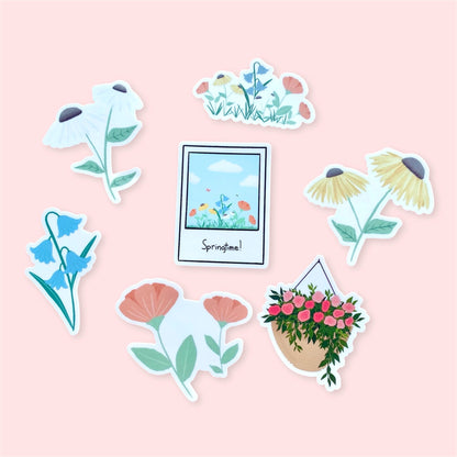 Set of 7 floral and nature-themed spring stickers on a pink background