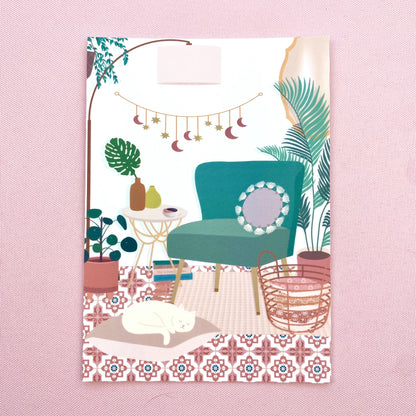 Postcard with illustration of a cozy living room with a teal chair, plants, and a rug on a pink background