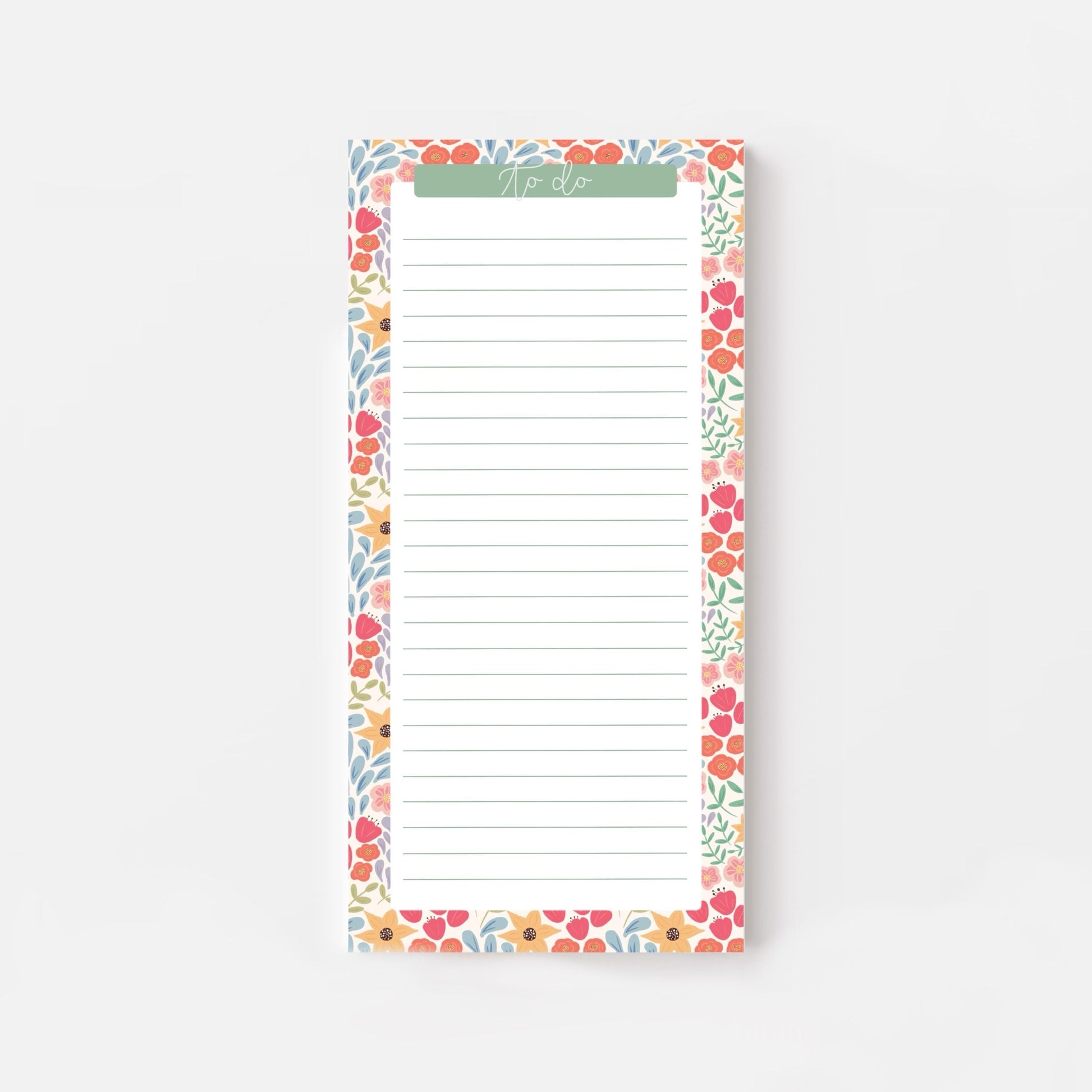 Floral bordered and lined slim notepad on a white background