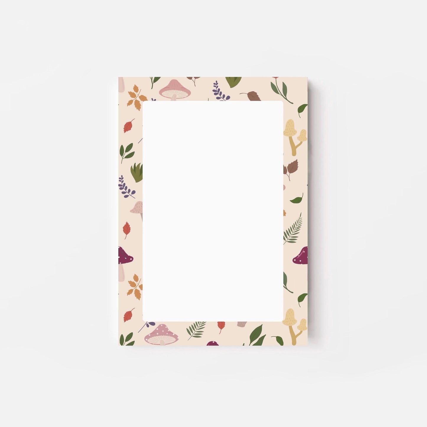 A6 notepad with leaf and mushroom pattern on a white background