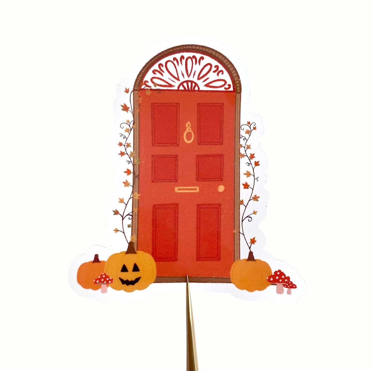 Decorative Halloween door sticker with pumpkins and a red door on a white background