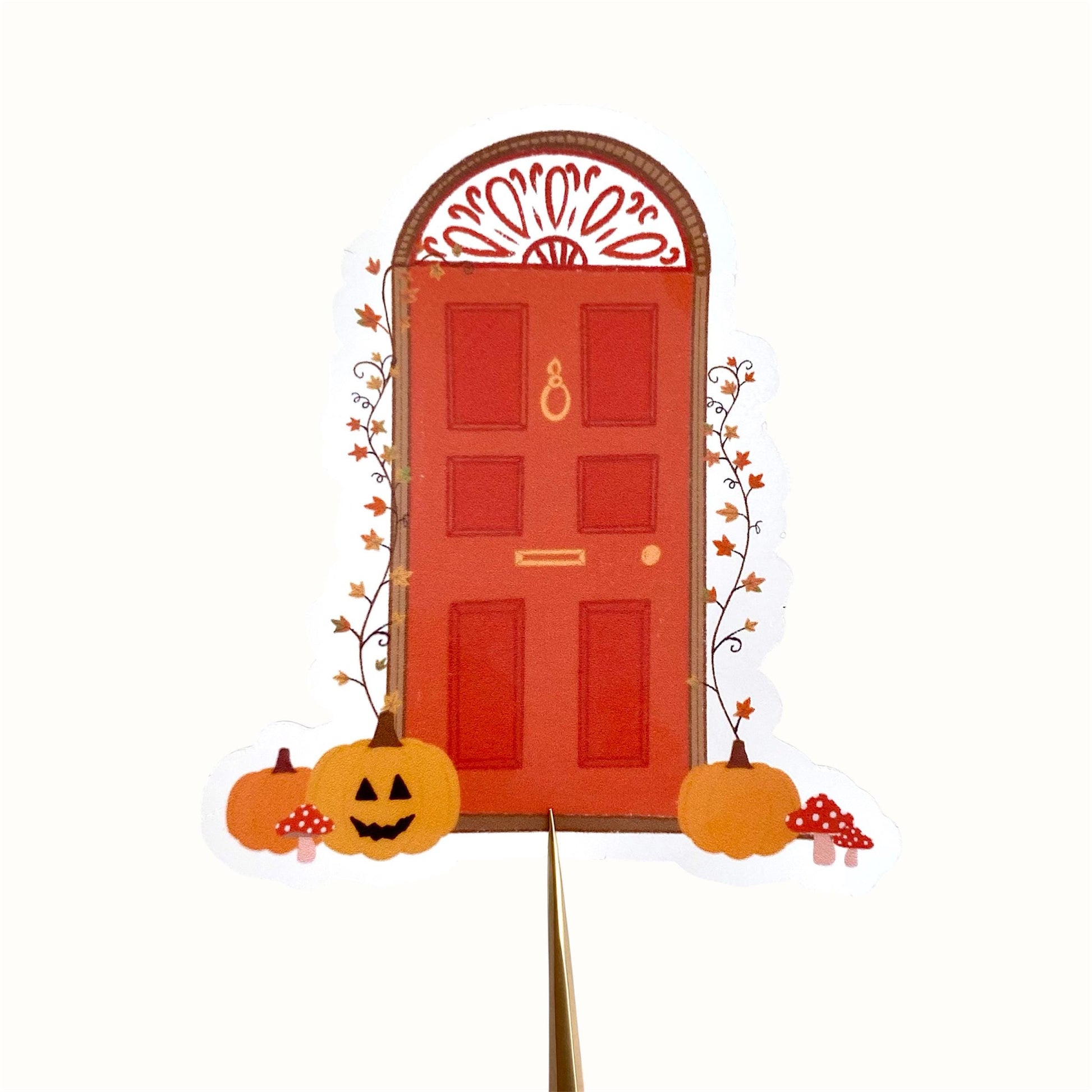 Decorative Halloween door sticker with pumpkins and a red door on a white background