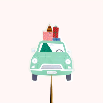 Sticker with illustration of a green car with Christmas decorations on a white background