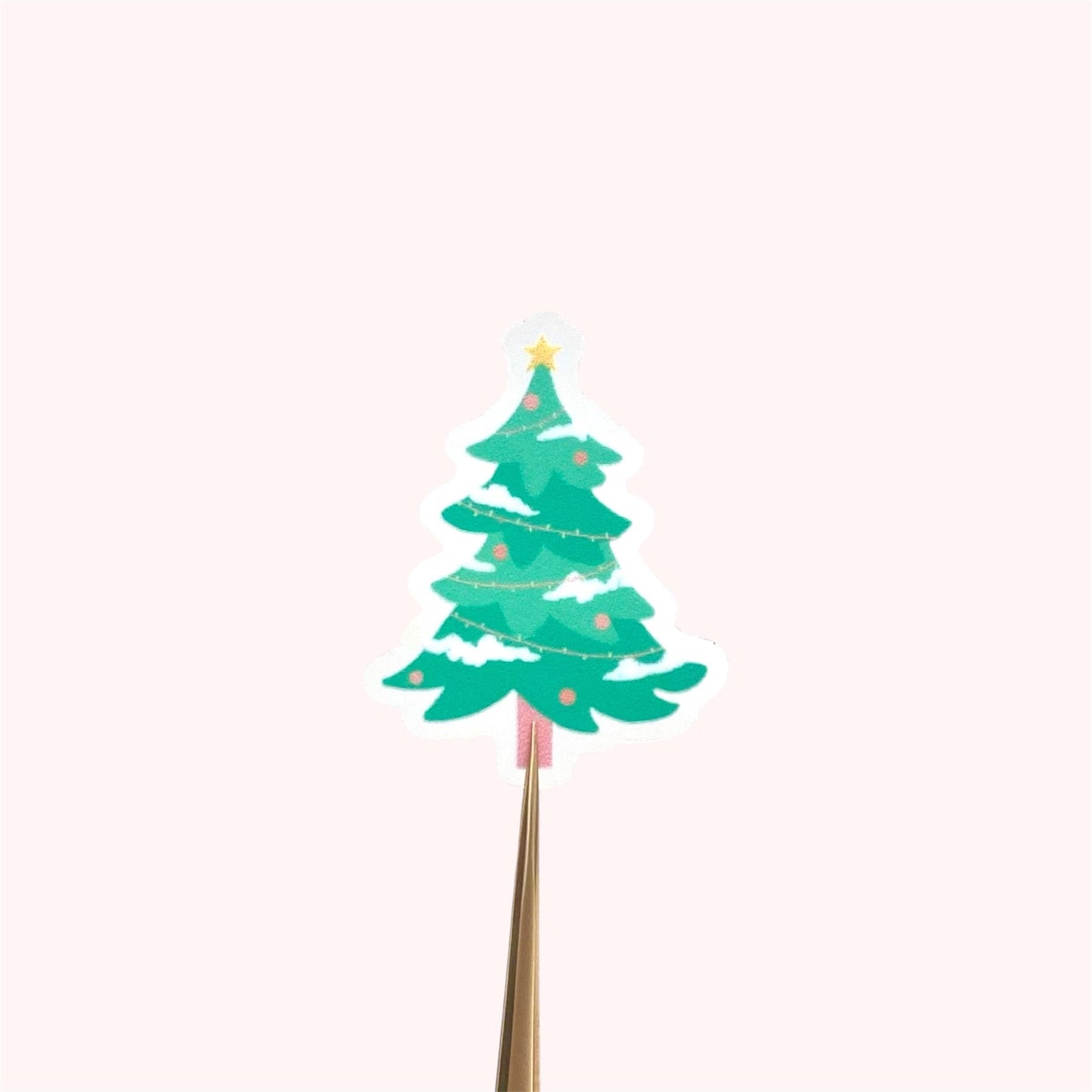 Green Christmas tree sticker on a white background