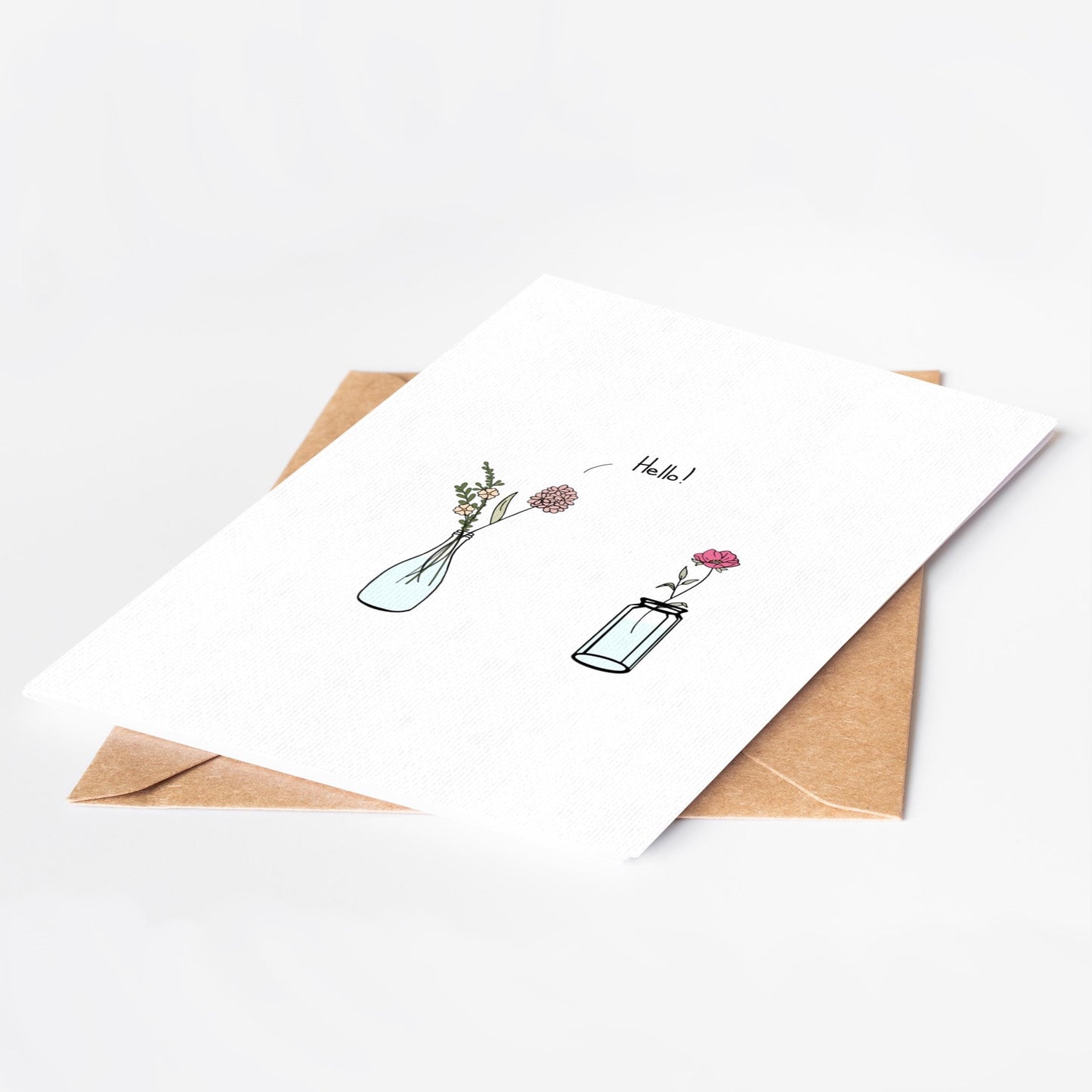 Greeting card with floral design and envelope on a white background
