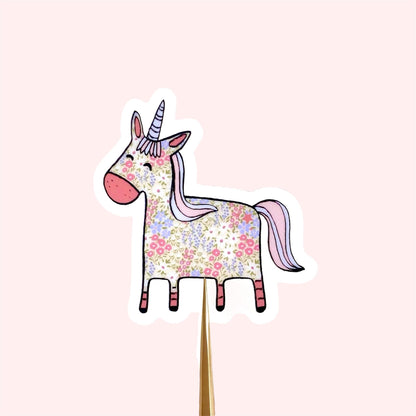 Floral patterned pink and blue unicorn on a transparent vinyl sticker