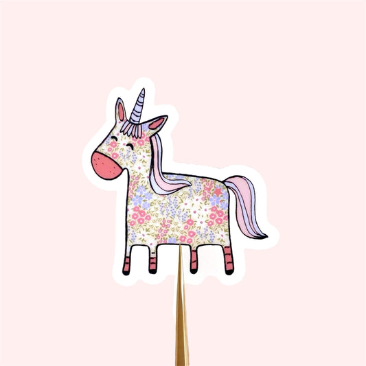Floral patterned pink and blue unicorn on a transparent vinyl sticker