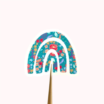 Decorative rainbow sticker with floral patterns on a white background