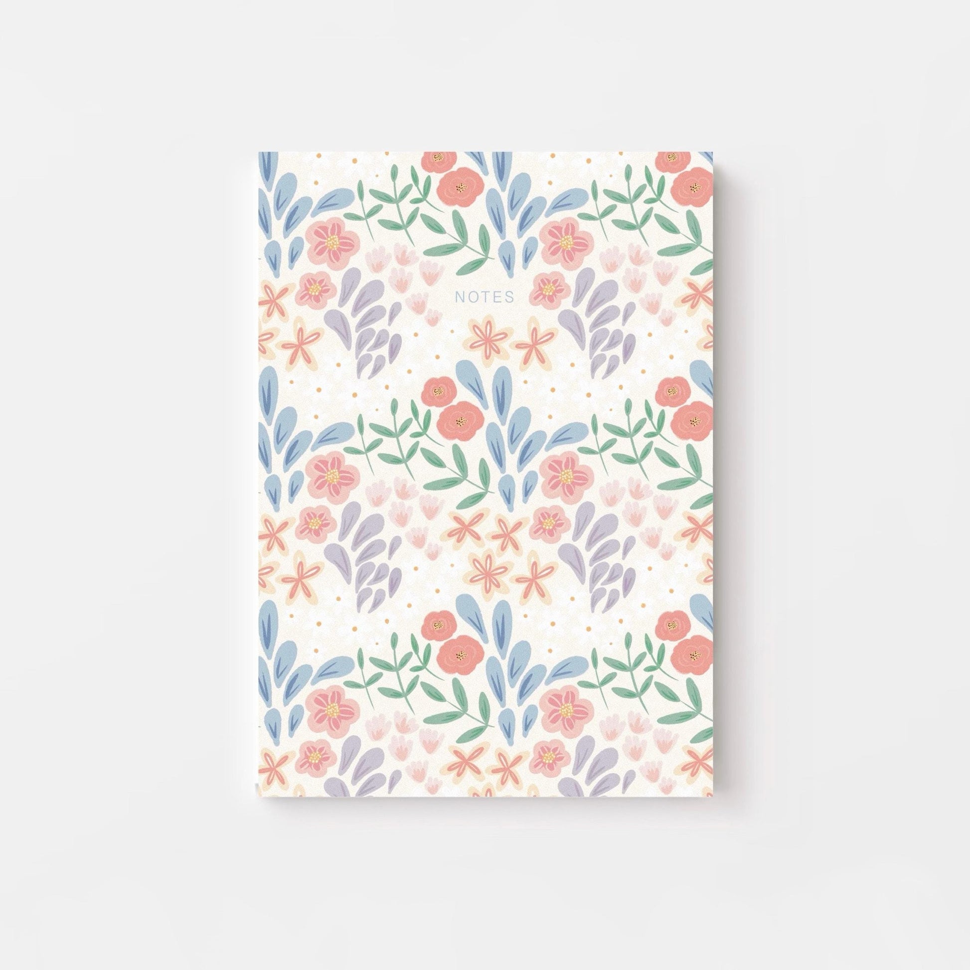 Notebook with floral pattern on a white background