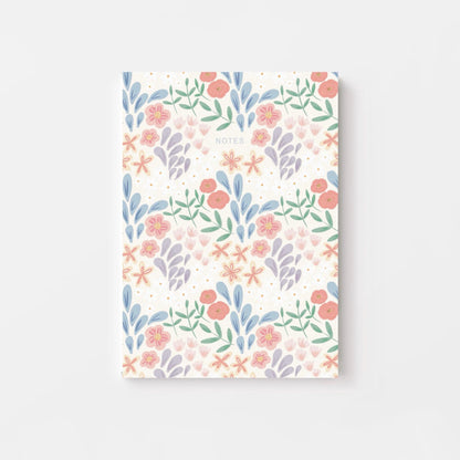 Notebook with floral pattern on a white background