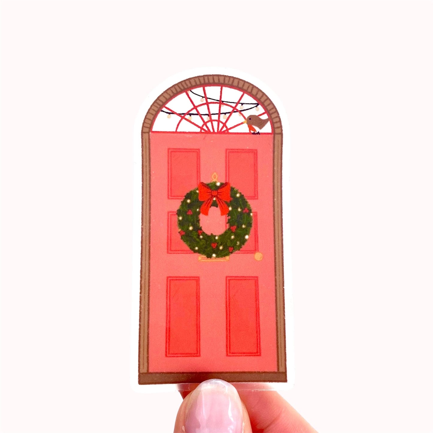 Red door sticker with a wreath and bird on a white background