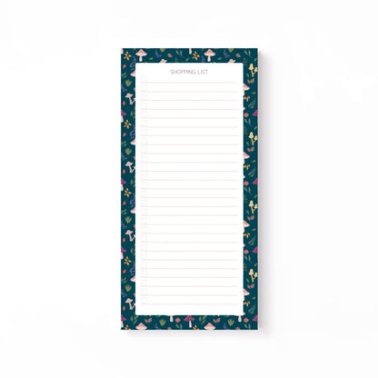 Autumn foliage-patterned shopping list notepad on a white background