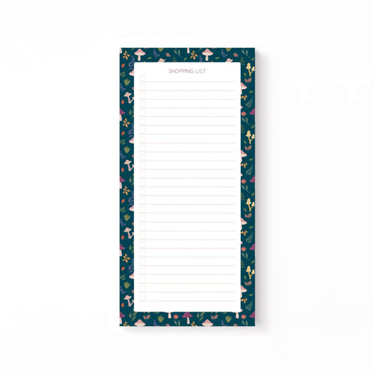 Autumn foliage-patterned shopping list notepad on a white background