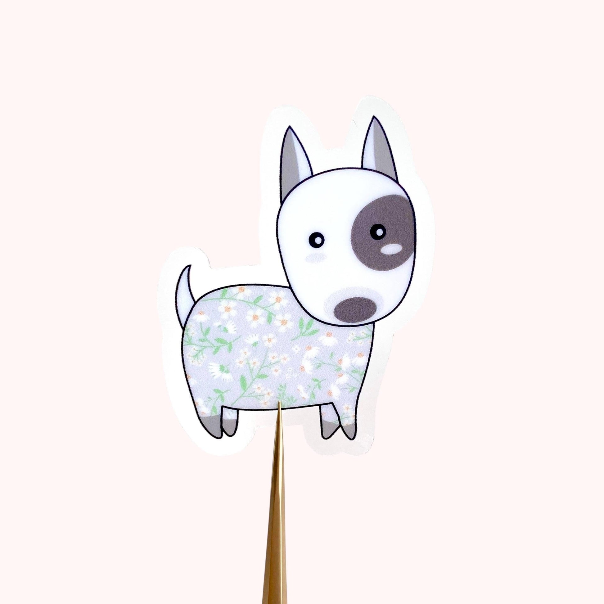 Cartoon dog sticker with floral pattern on a white background