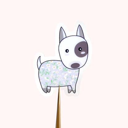 Cartoon dog sticker with floral pattern on a white background