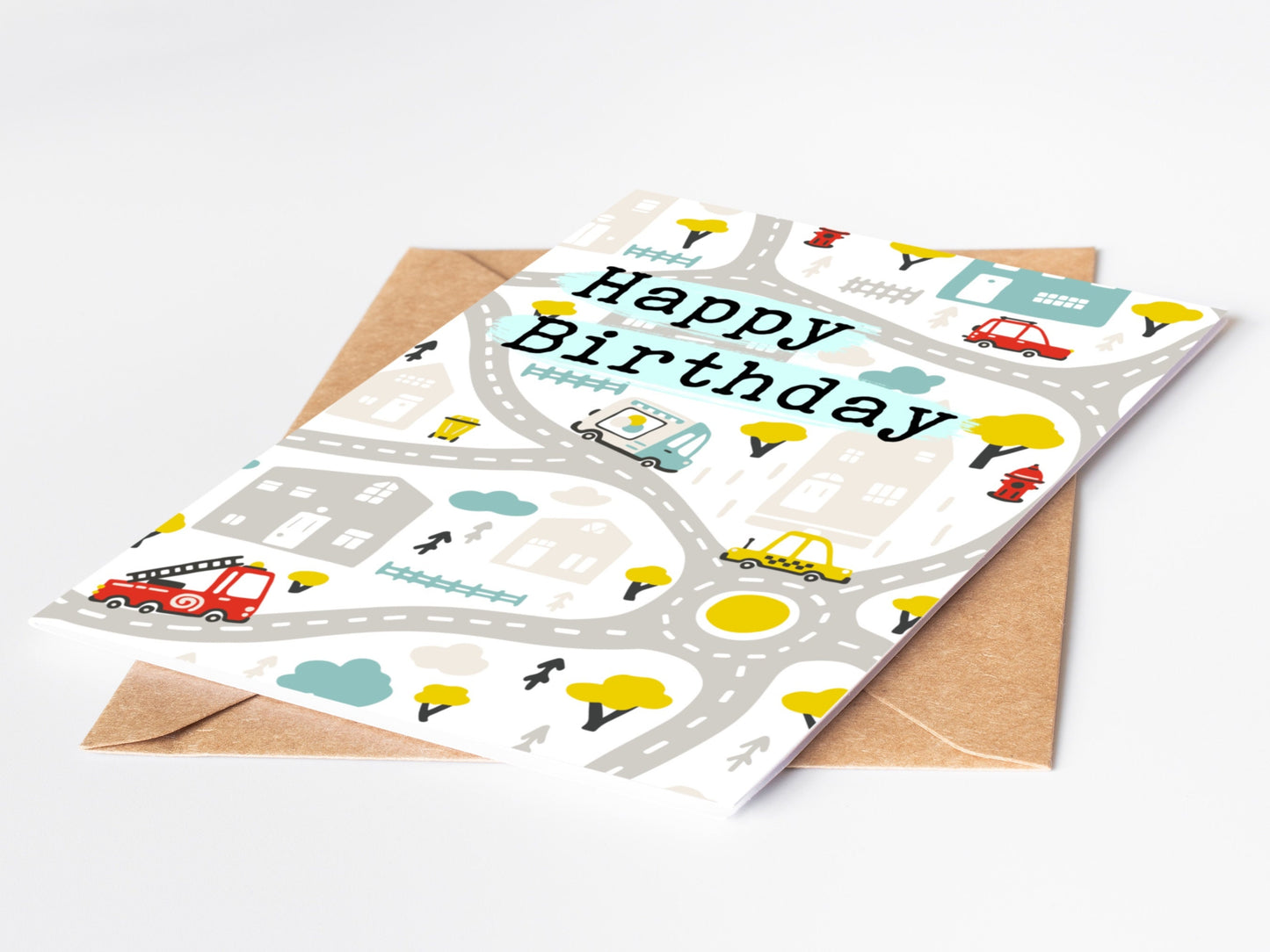 Birthday card with road map design and 'Happy Birthday' text, featuring vehicles, houses, trees and roads on a white background.